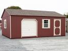 14x24 Custom Peak Shed with Overhead Door, Single Door, and Red LP Smart Side Siding